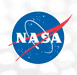 NASA logo featuring a blue circle with white stars, bold white NASA lettering, a red chevron-shaped vector, and a white orbital path curving around the text.